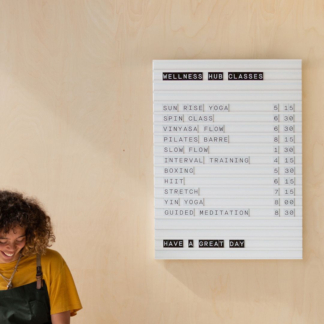 letter menu board installed behind a coffee bar counter with coffee cafe menu display