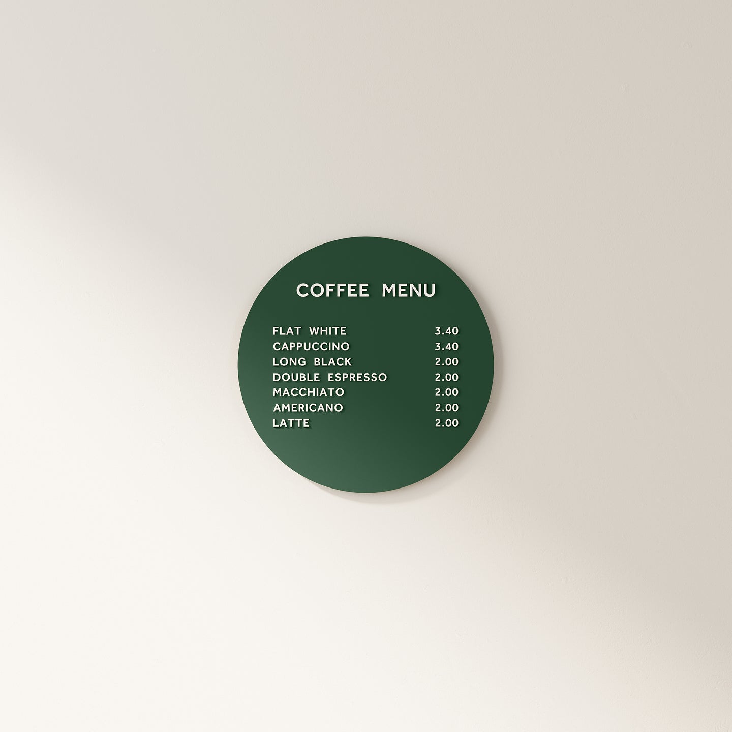 black circle menu board installed on a wall with white letters