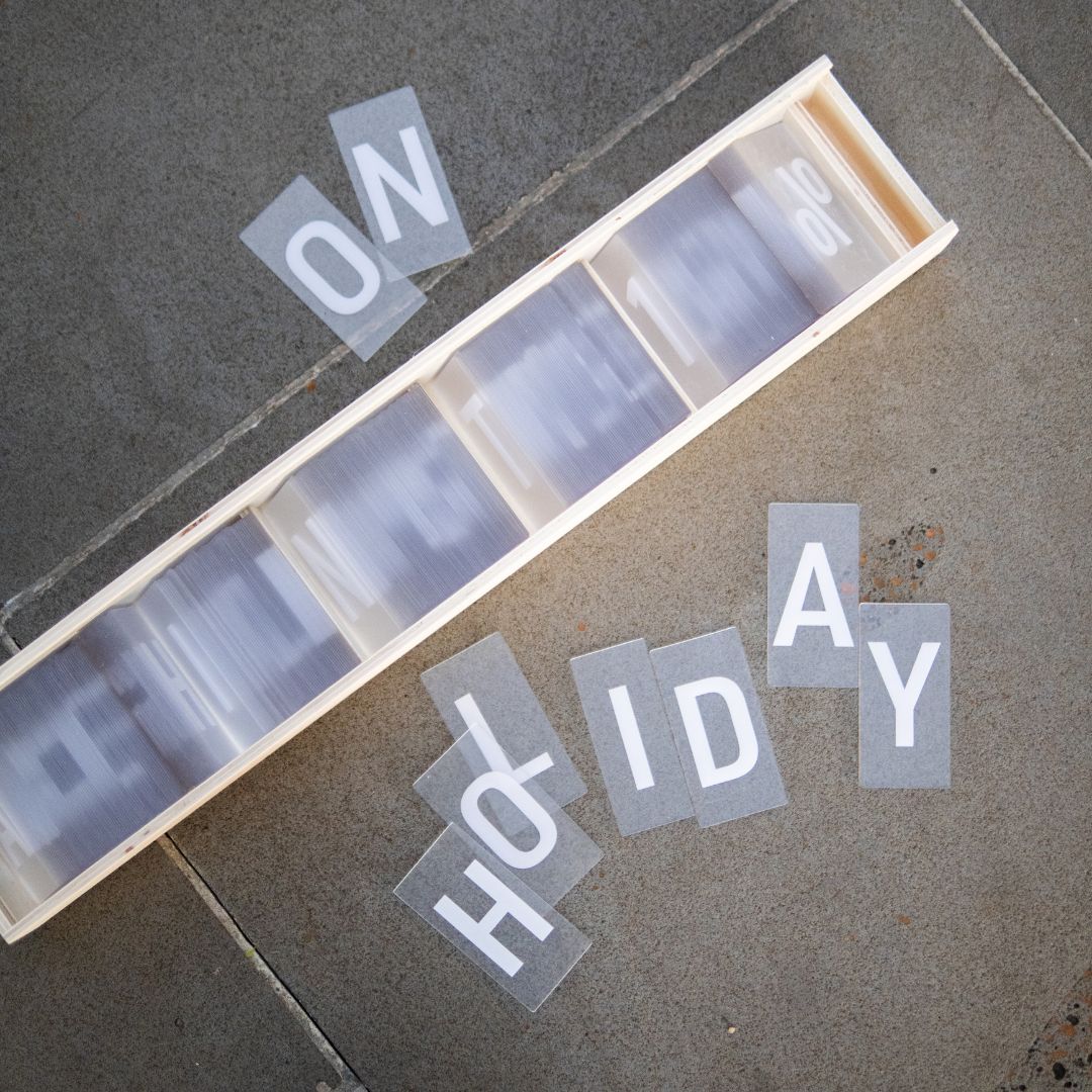 close up of letters included with the letter swing sign