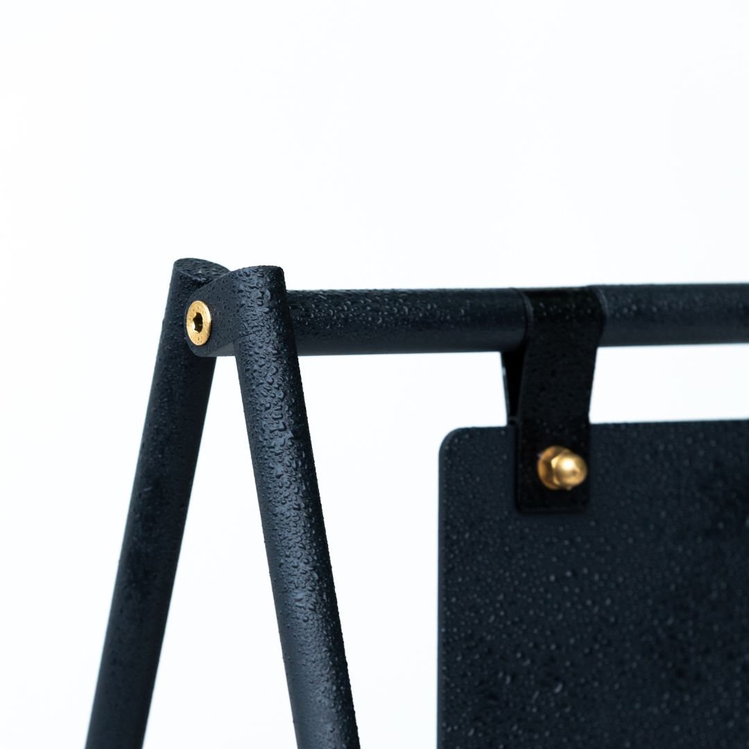 close up of joinery and bolts on large letter sidewalk sandwich board sign