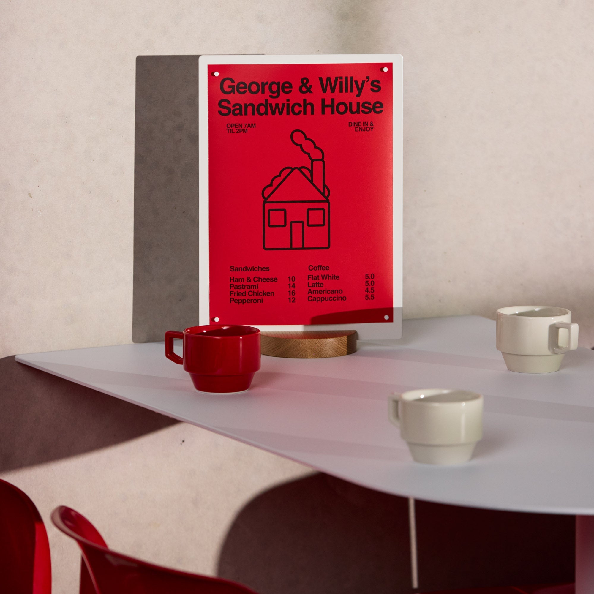large white table talker on a tabletop showing red message display