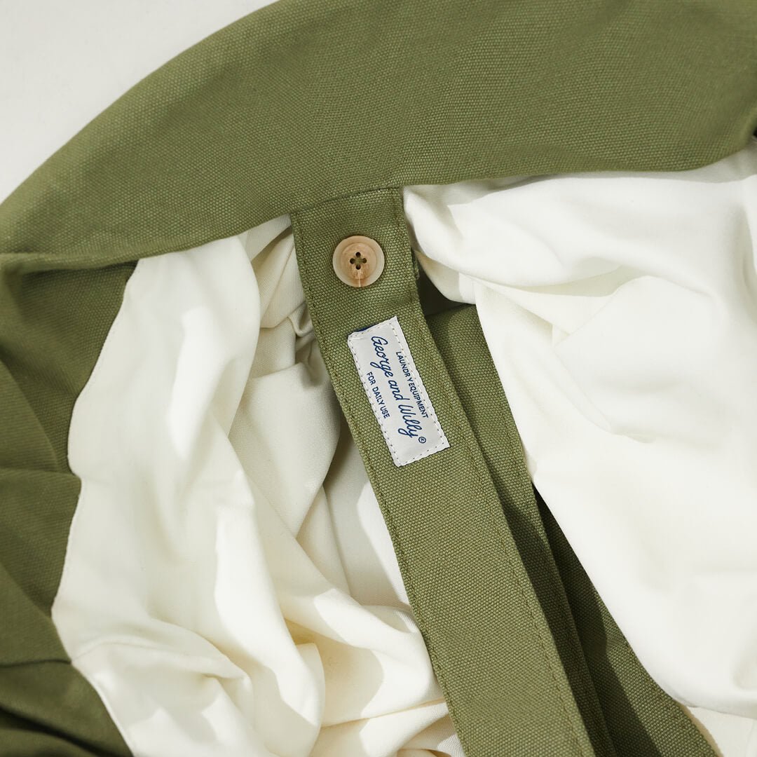 close up of the handle fixings of the laundry holder in green