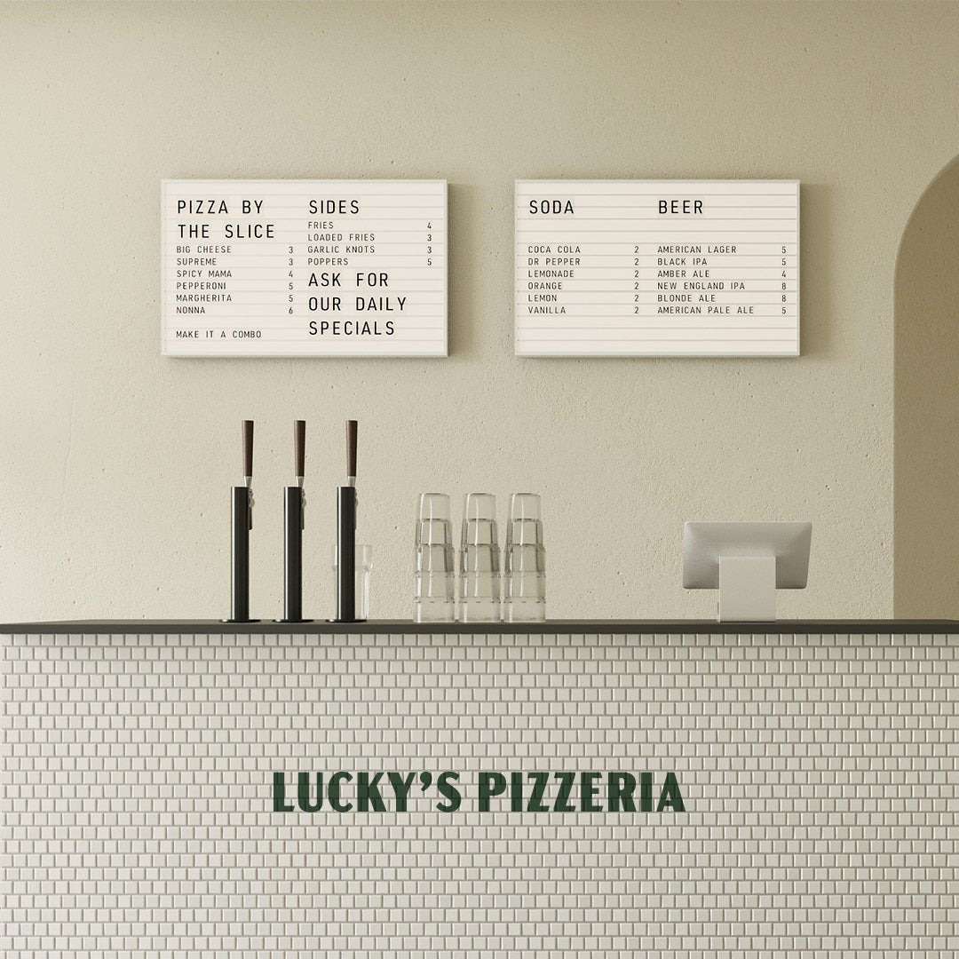 two letter light box menus installed side-by-side behind a cafe counter