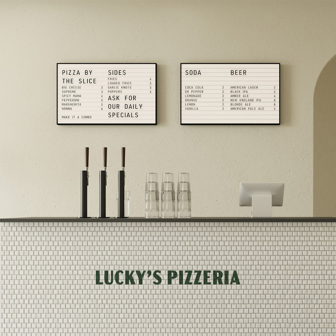 two letter light box menus installed side-by-side behind a cafe counter