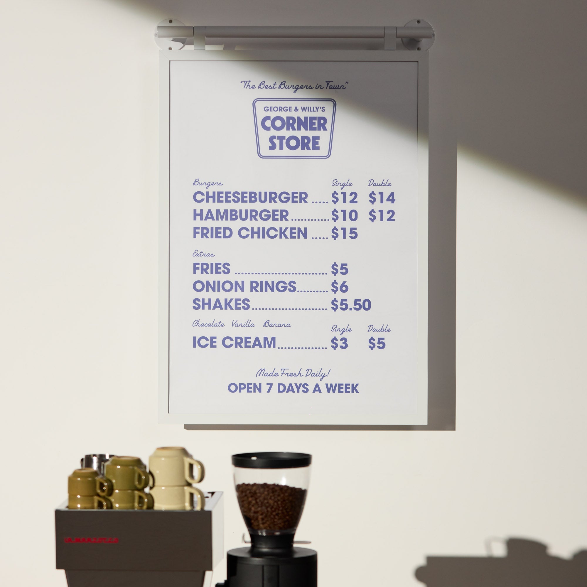 white poster hanging menu board installed behind counter top