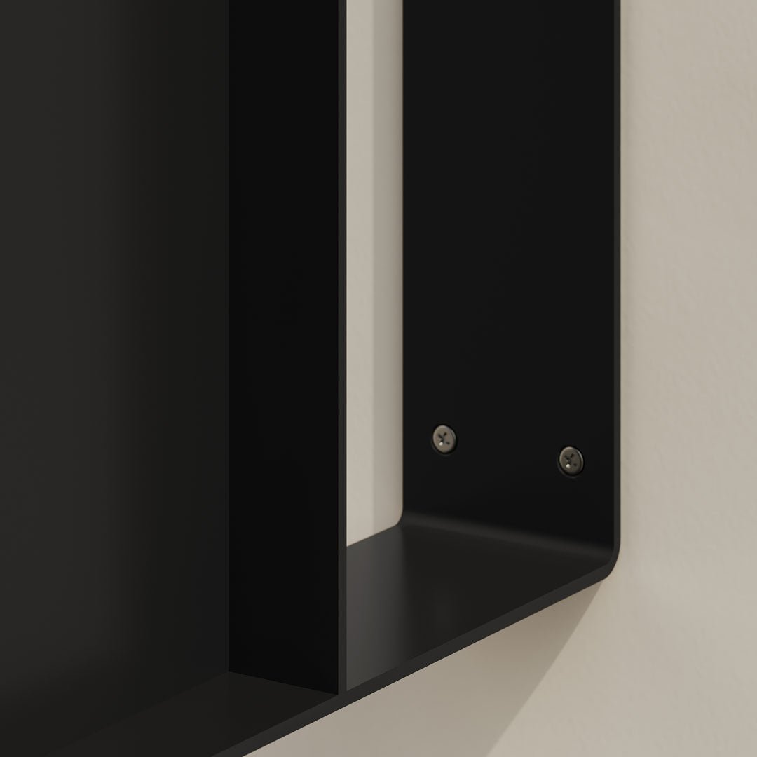 close up of the screws installed in the metal wall sign