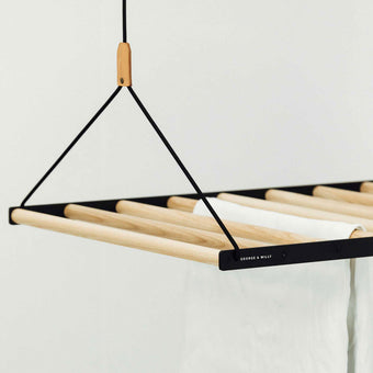 close up of joinery and bolts used on ceiling hanging drying rack
