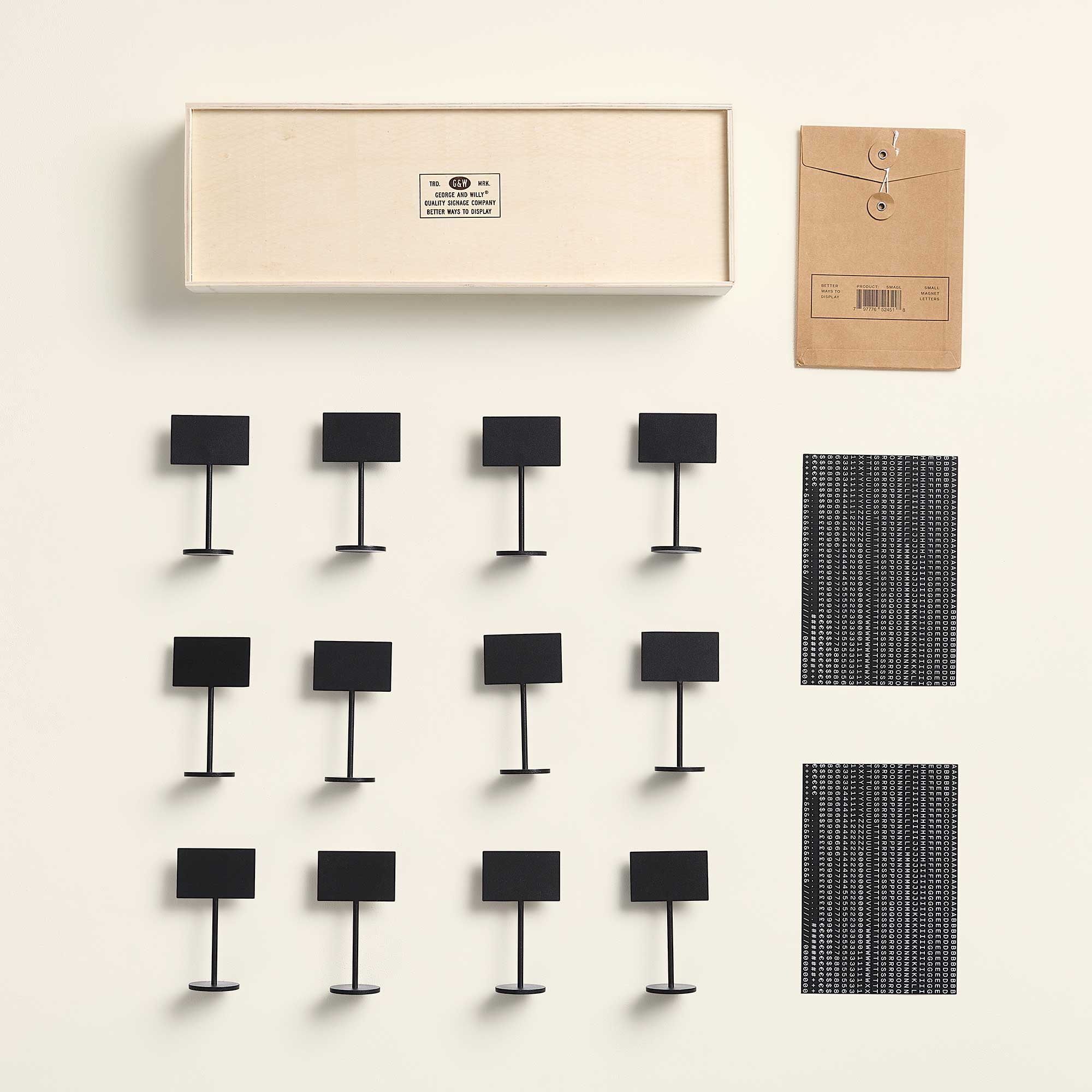 photo of the contents and packaging of the standing counter sign so you can see what comes with them