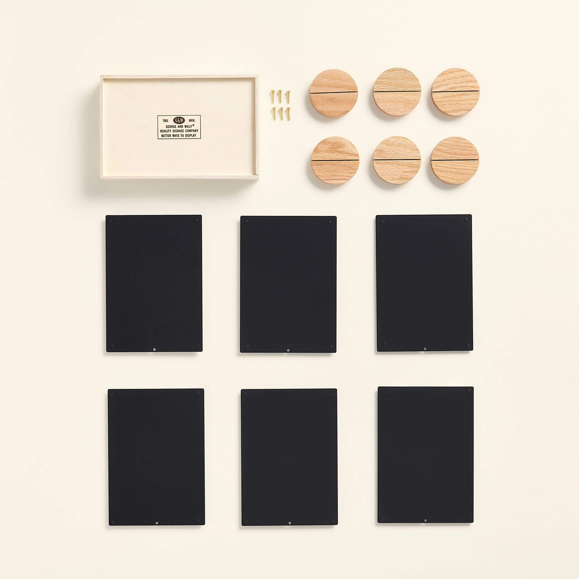 table talker packaging contents laid out showing 6 panels, 6 bases and wooden box