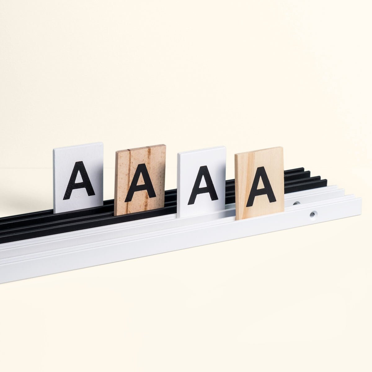 close up photo showing different rail and letter colour combinations offered
