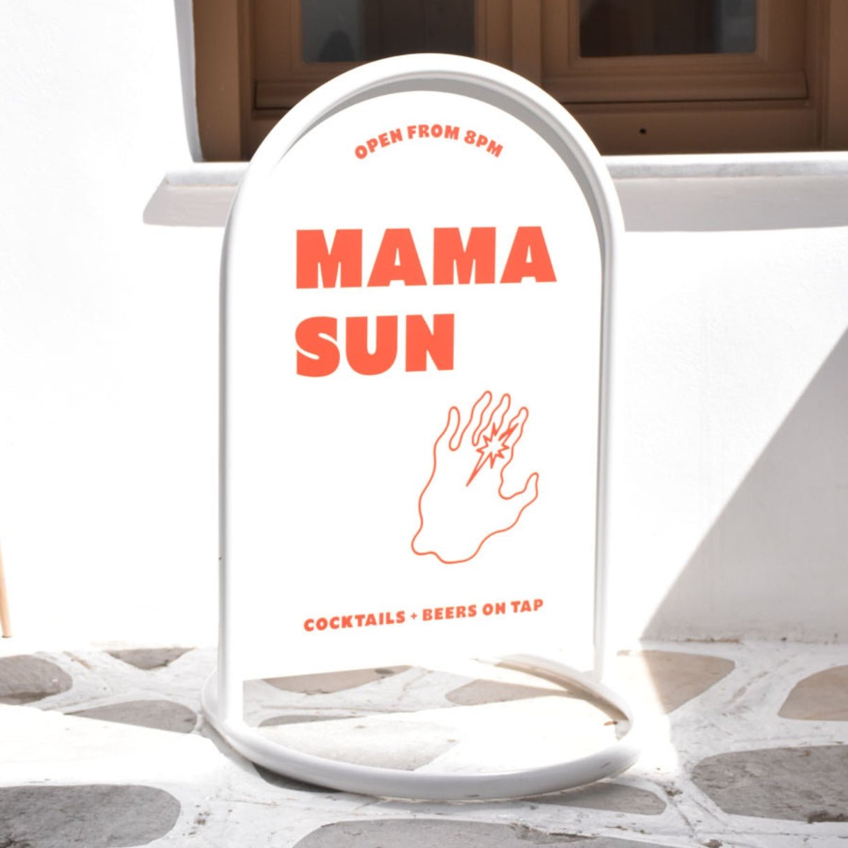 white rounded sandwich board pavement sign with red logo branding applied