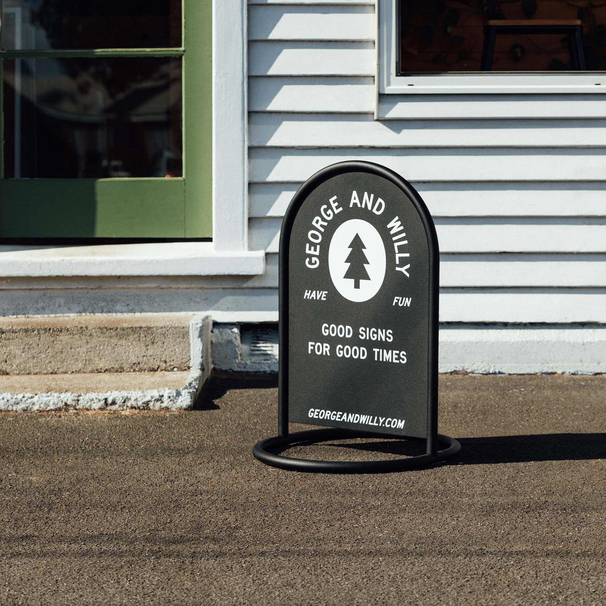 Rounded Sidewalk Sign. - George and Willy