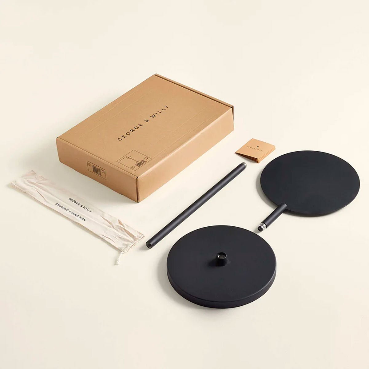 photo of the contents of the standing round sign including packaging all placed neatly